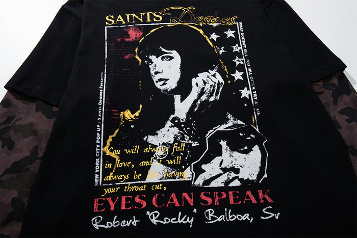 Close-up of the black T-shirt front showing a portrait rock graphic with gold, white, and red lettering