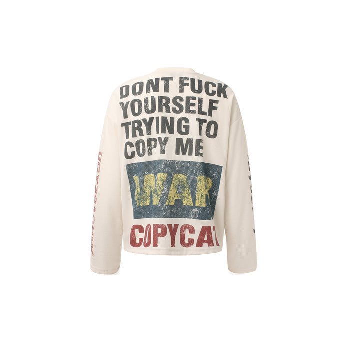 Back of cream waffle long sleeve shirt with large distressed graphic text