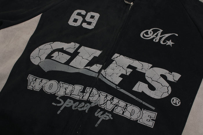 Close-up of GLFS front print on black zip hoodie with cracked gray lettering