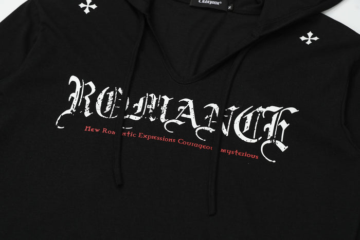 Close-up of black hoodie front with gothic logo, chest symbols, and drawstrings
