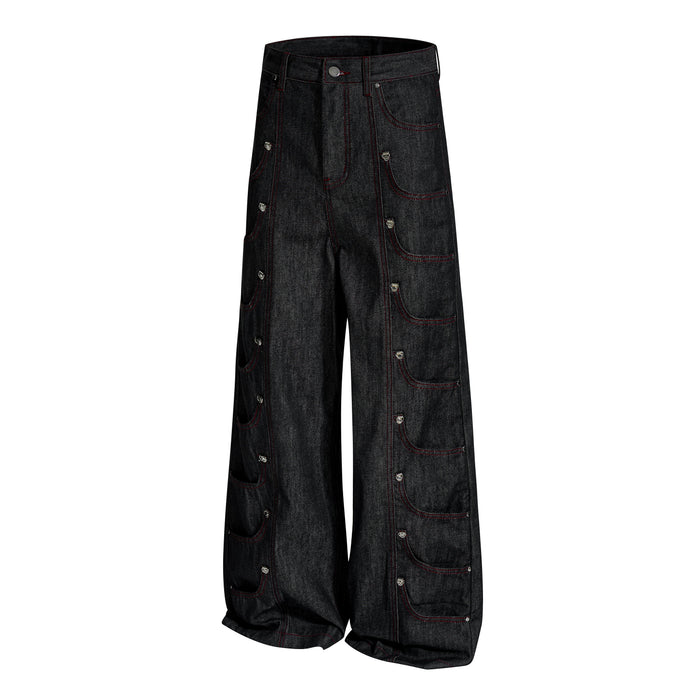 Angled front view of black wide-leg denim pants with red stitching and side cargo-style pockets