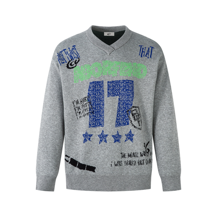 Gray V-neck knit sweater with graffiti-style graphic text and blue, green, and black prints on the front