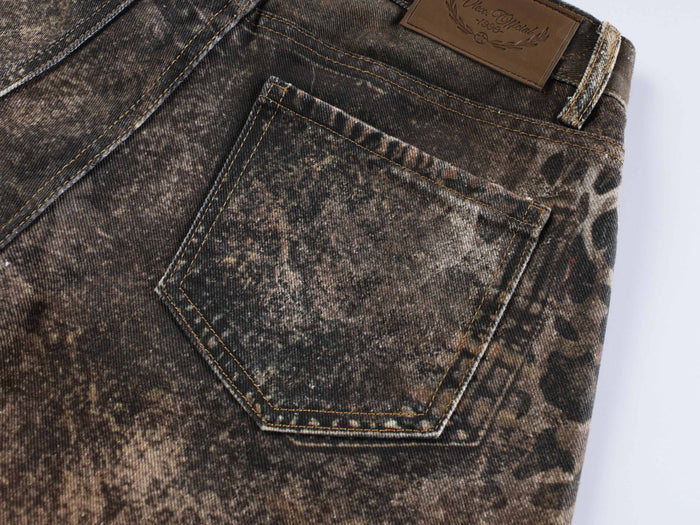 Back pocket detail on dark animal print denim jeans