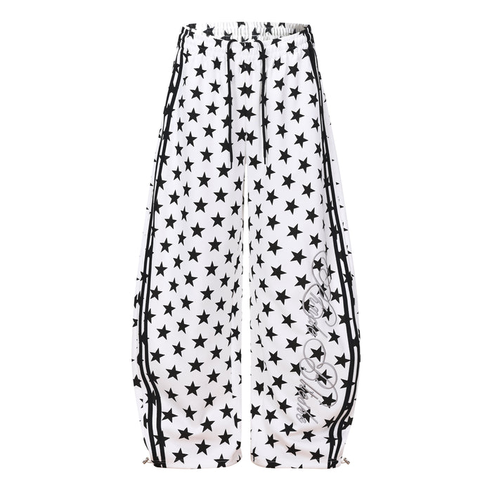 White wide-leg sweatpants with black star print and striped side panels, front view
