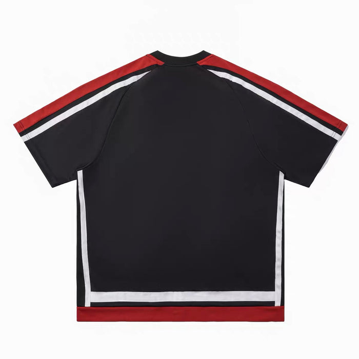 Black oversized varsity mesh tee with red and white striped sleeves and trim, shown flat on a white background