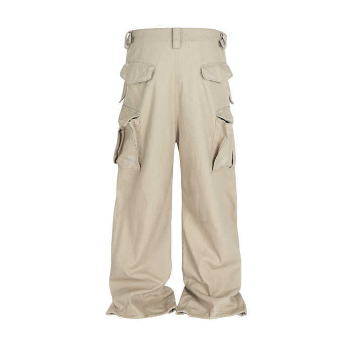 Beige wide-leg cargo pants with flap pockets and buckle waist, front view