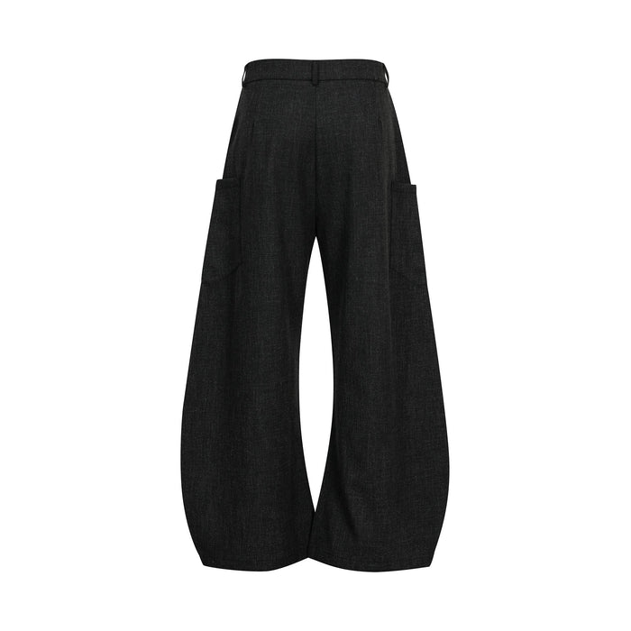 Black wide-leg cargo pants with side pockets and oversized silhouette, back view