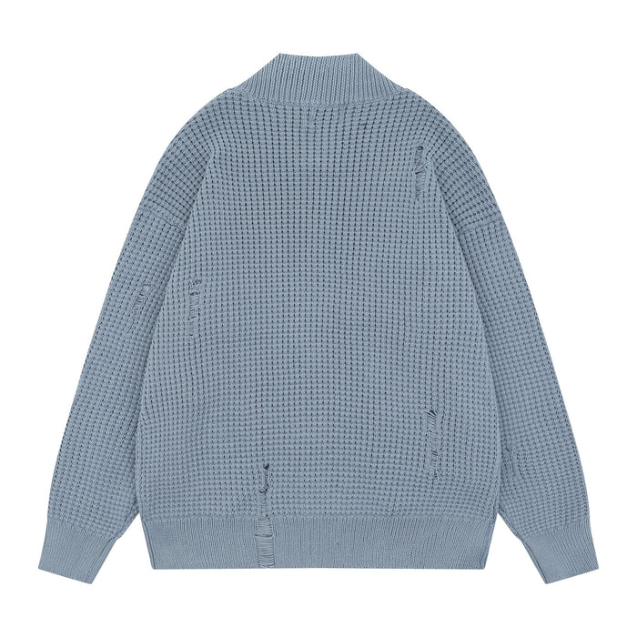 Light blue waffle knit cardigan, back view with distressed holes and ribbed collar