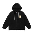 Black sherpa fleece zip-up hoodie jacket shown from the front with white drawstrings, chest patch, and adjustable hem