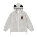 Oversized sherpa fleece zip-up hoodie in light grey with NOHEU varsity embroidery on back, front chest logo, and drawstring h