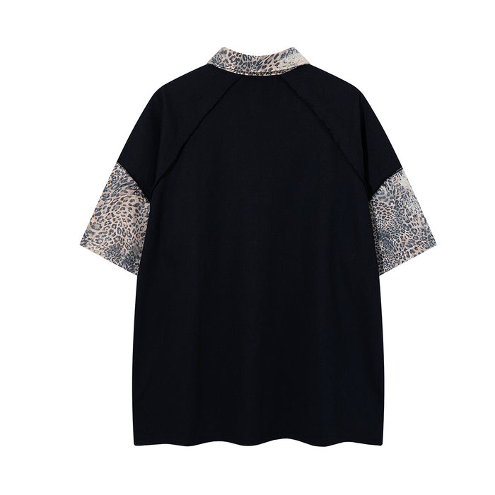 Back view of black collared shirt with leopard-print collar and short sleeves