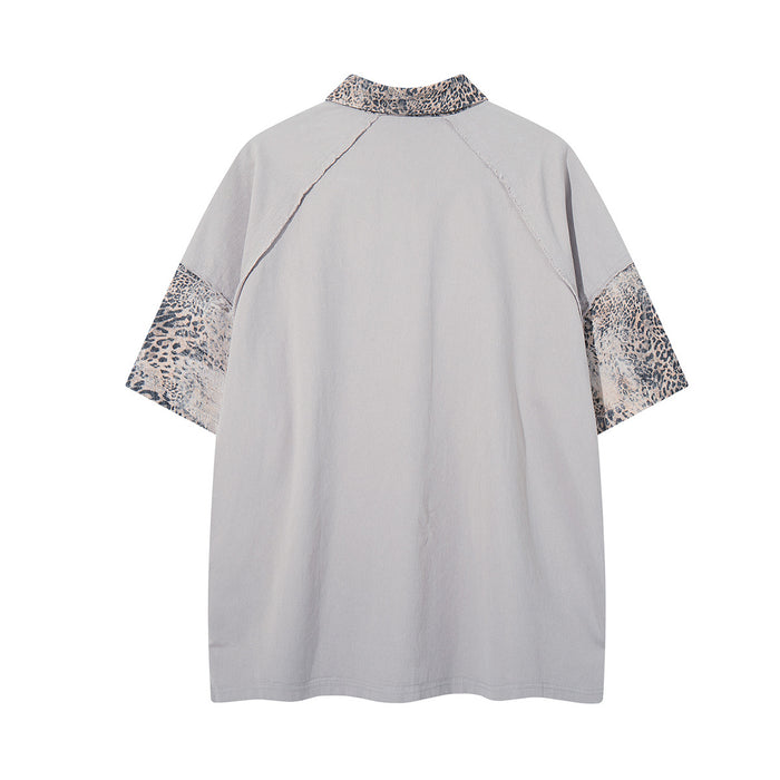 Back view of gray collared shirt with leopard-print collar and sleeve panels