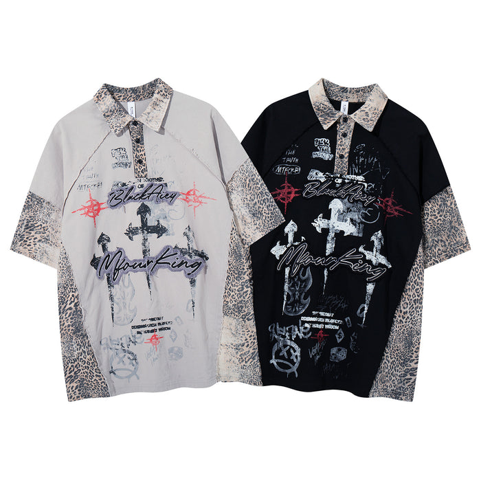 Two front-facing collared shirts in gray and black with leopard-print panels and contrasting graffiti graphics