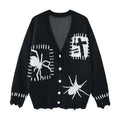 Men's oversized V-neck knit cardigan with spider and cross jacquard graphics and distressed hem in black