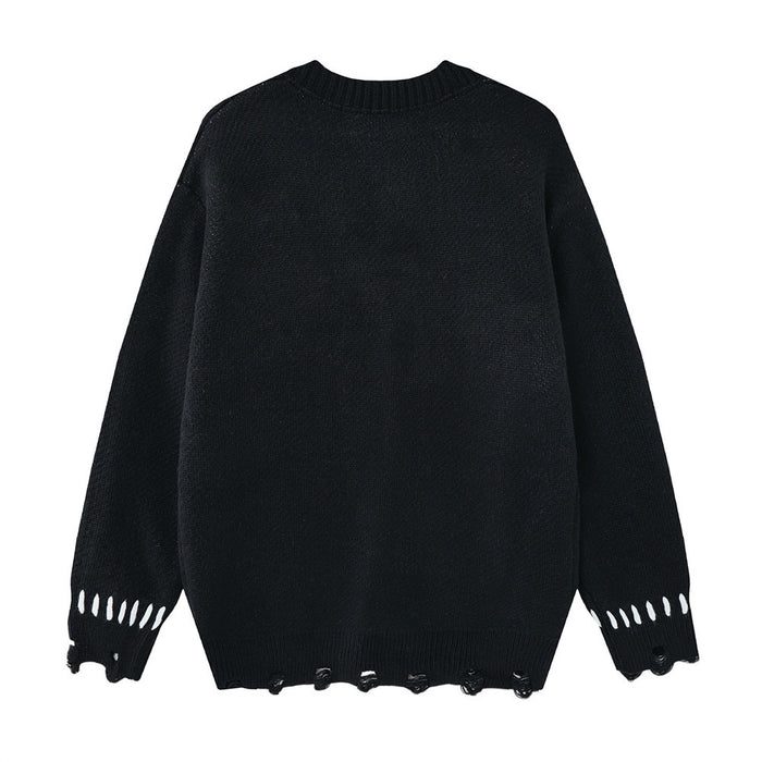 Black knit cardigan shown from the back with a plain body, ribbed collar, and distressed hem and cuffs