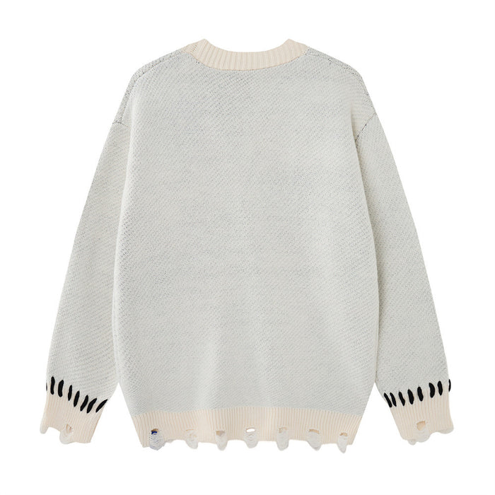 Cream knit cardigan shown from the back with a plain body, contrast ribbed collar, and distressed hem and cuffs