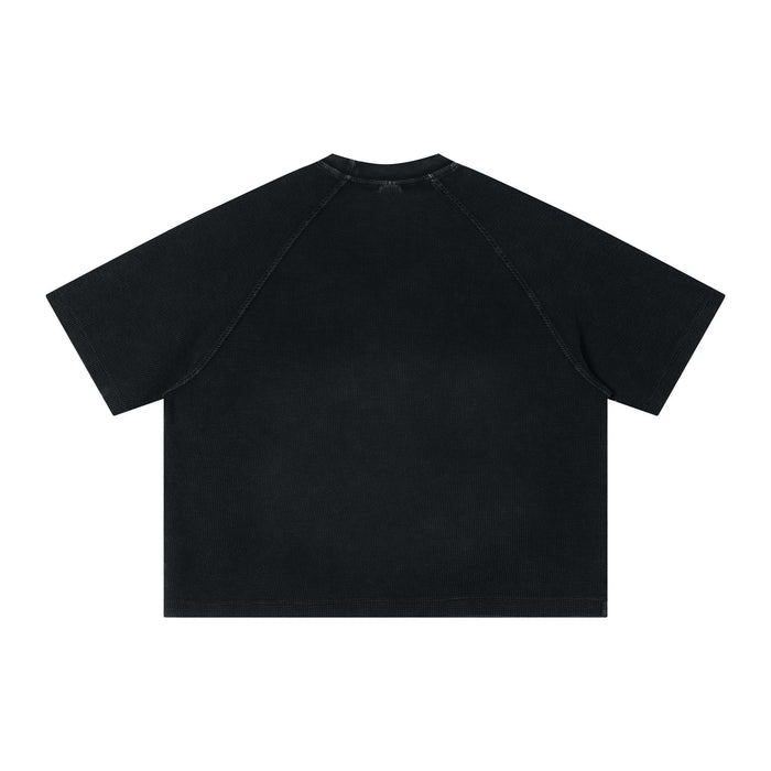 Black textured short-sleeve streetwear T-shirt shown from the back on a plain white background