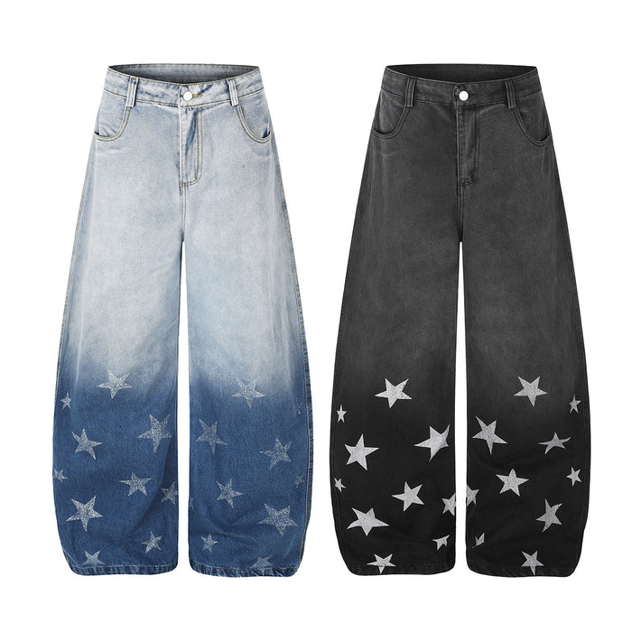 Front view of wide-leg star print jeans in light blue and black gradient washes