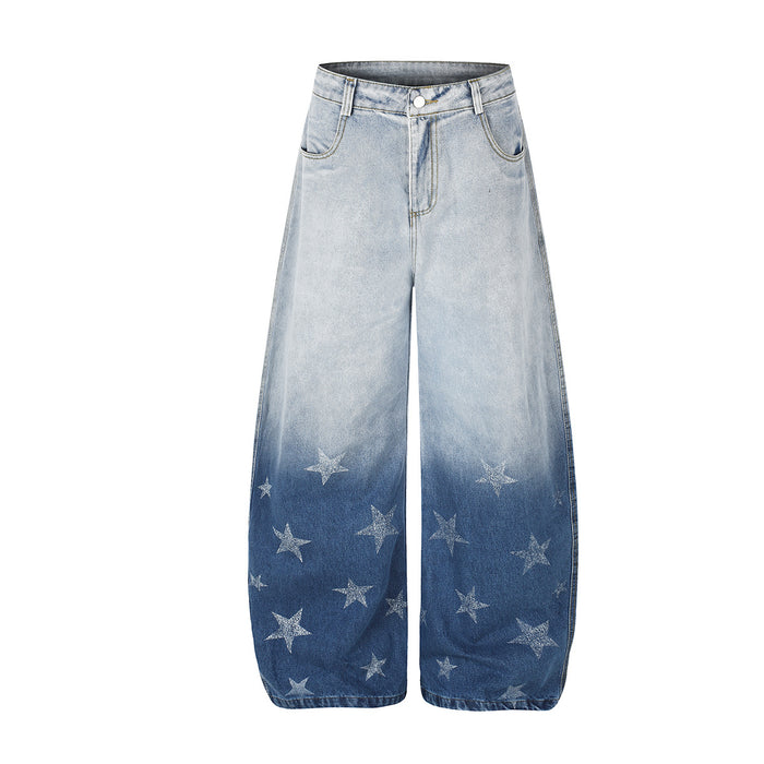 High rise baggy wide-leg jeans with gradient ombre wash and star print detail on lower legs, shown in blue and washed black