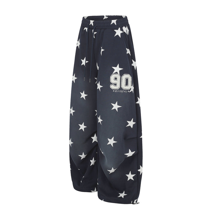 Navy star print wide-leg sweatpants, angled front view