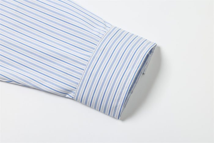 Cuffed long sleeve with light blue and white vertical stripes
