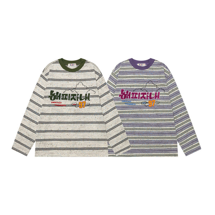 Two striped long-sleeve shirts shown front-facing in cream and purple colorways with embroidered chest graphics
