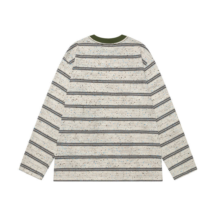 Cream long-sleeve shirt shown from the back with horizontal black striped pattern and green ribbed collar