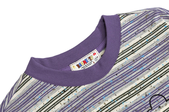 Close-up of the purple ribbed collar and striped fabric on the long-sleeve shirt