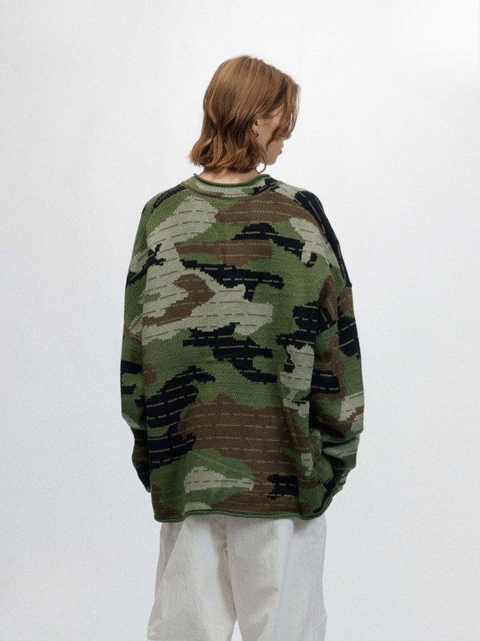 Green camo pullover sweater worn by model, back view