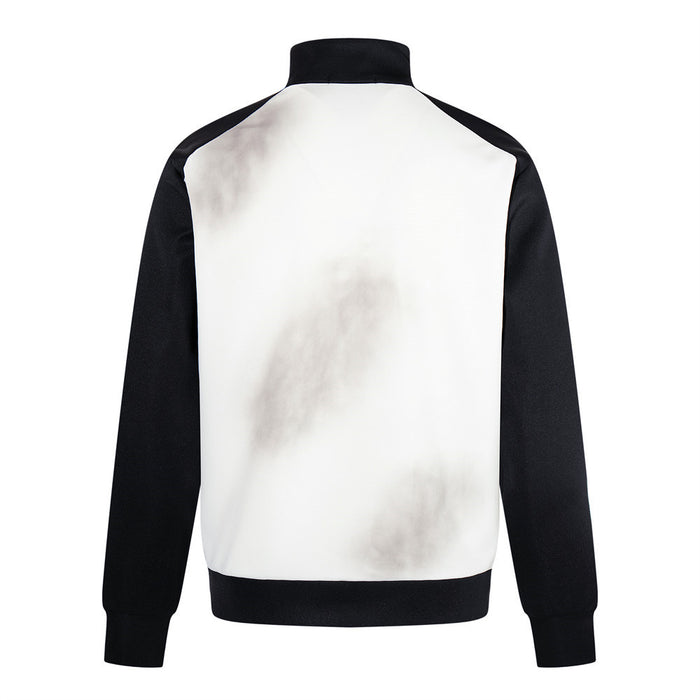 Back view of a white smoke-dyed track jacket with black raglan sleeves, mock neck and ribbed hem