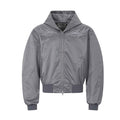 Boxy hooded bomber jacket with tribal flame embroidery on chest in silver colorway, front view