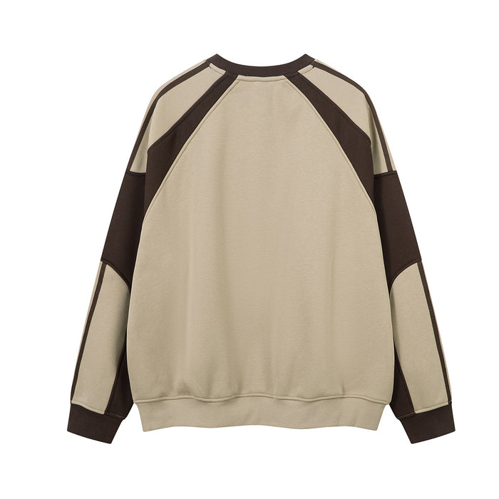 Back view of the beige sweatshirt with dark brown colorblock raglan sleeves and striped shoulder panels