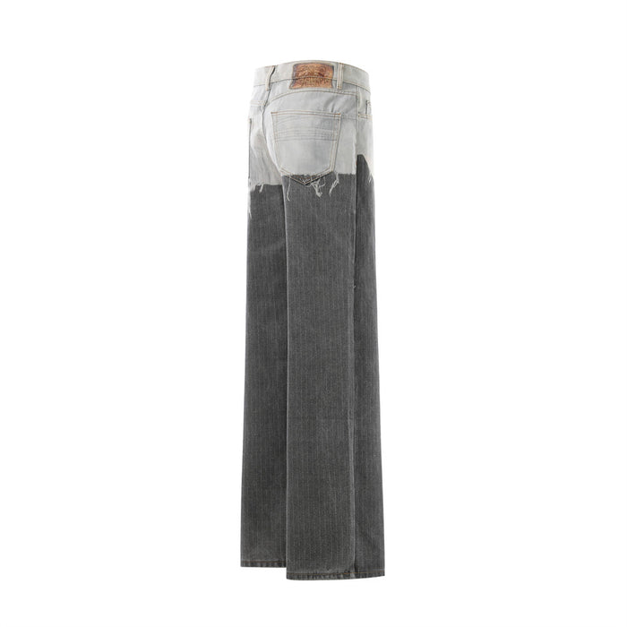 Side view of two-tone distressed wide-leg jeans showing contrast wash and wide leg shape