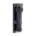 Wall mounted emergency torch in black sitting in its charging cradle
