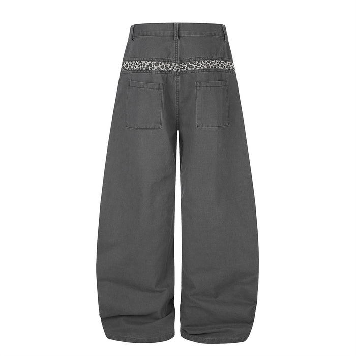 Charcoal wide-leg pants with leopard trim across the back waistband, back view