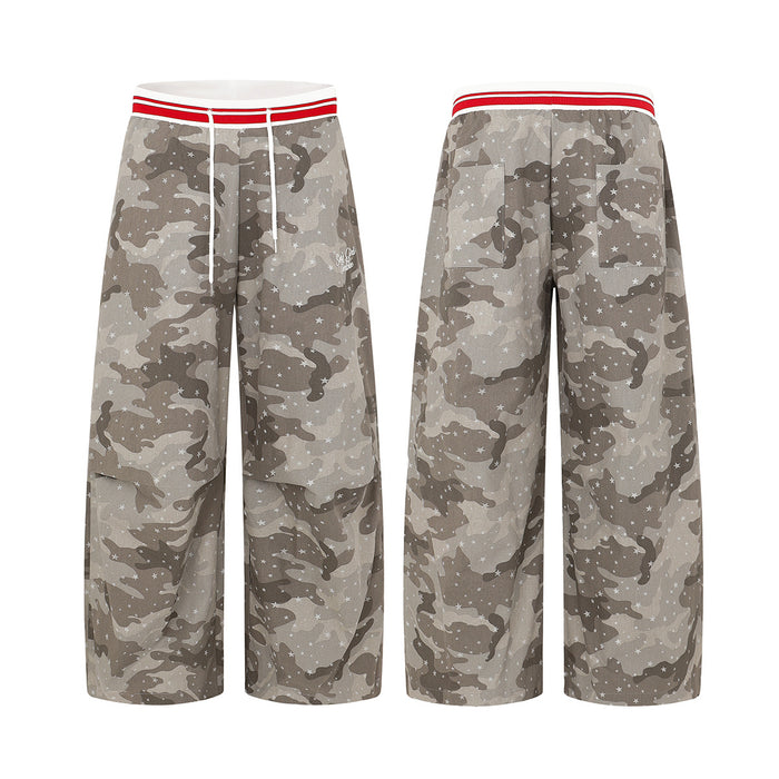 Wide-leg gray camouflage cargo pants shown in front and back views with white stars and red-striped waistband