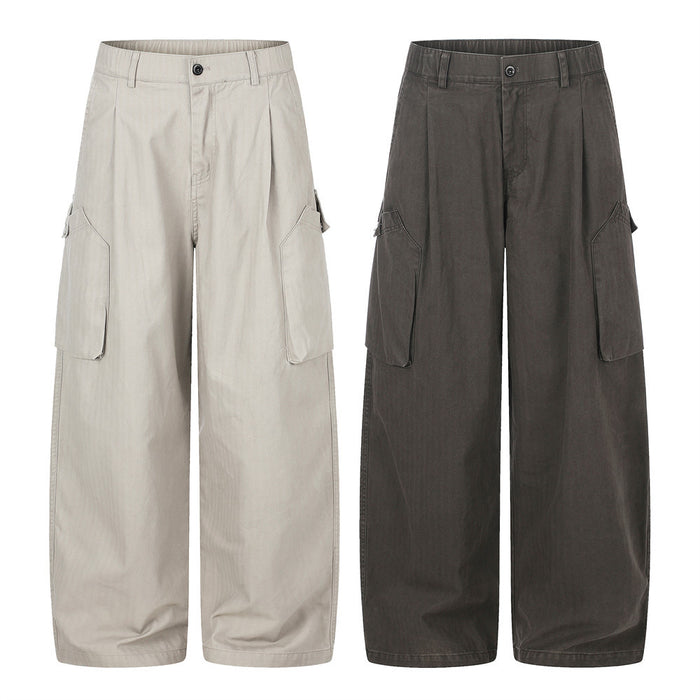 Beige and dark gray wide-leg cargo pants with side pockets, front view