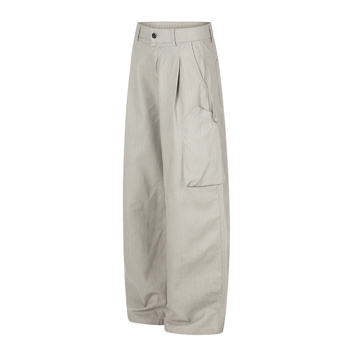 Beige wide-leg cargo pants with one side cargo pocket, angled front view