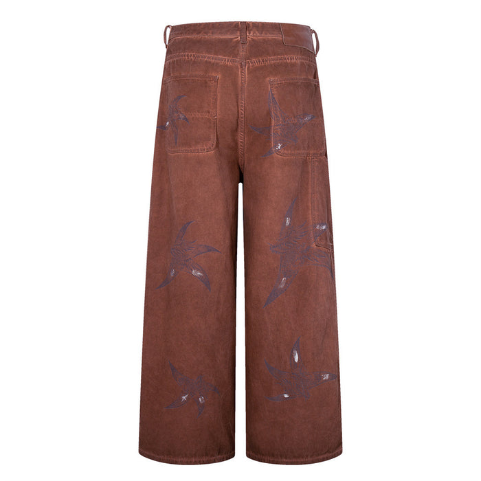 Back view of baggy brown cargo pants with bird print and rear patch pockets