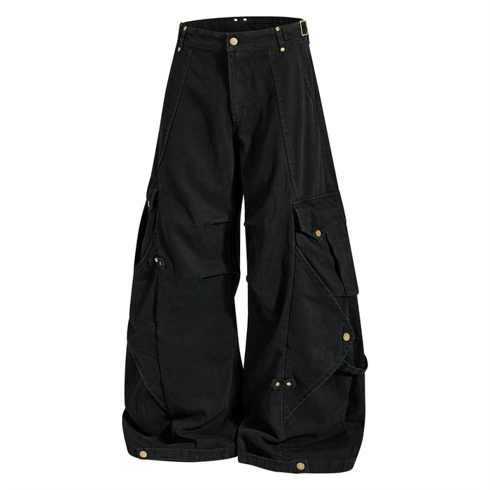 Black wide-leg cargo pants, front view with oversized side pockets and brass-tone hardware
