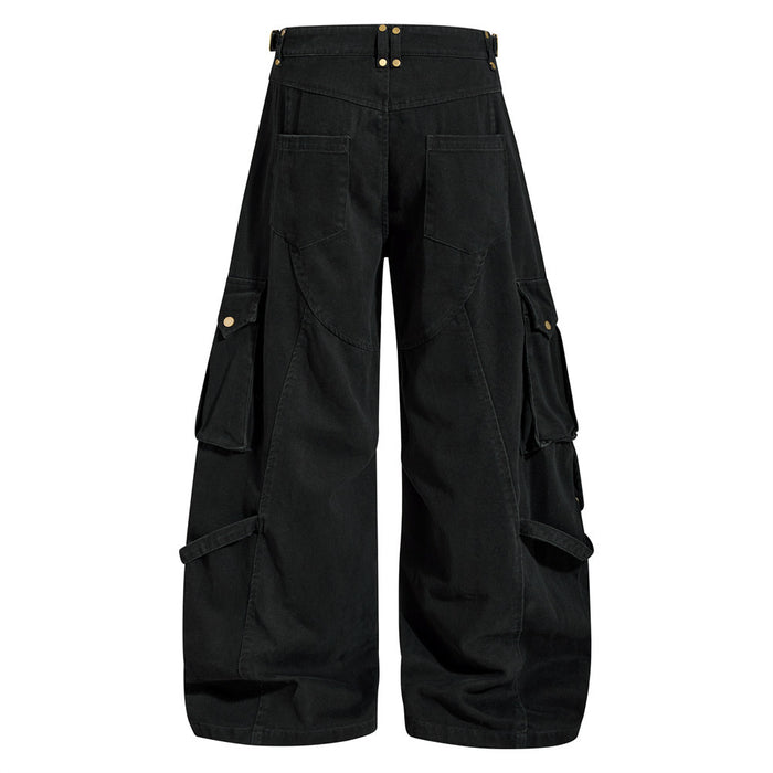 Black wide-leg cargo pants, back view with flap cargo pockets and deconstructed panel seams