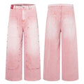 Pink washed wide-leg carpenter jeans with silver eyelet studded patchwork panels and oversized front pockets, front and back