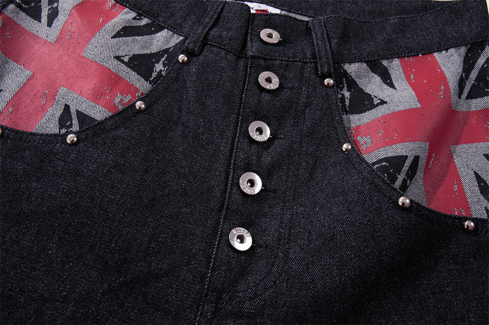 Close-up of button fly and curved front pocket openings with Union Jack print trim