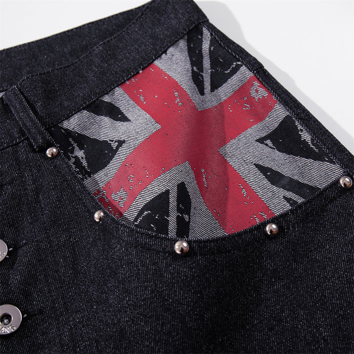 Close-up of a Union Jack printed front pocket on dark denim jeans