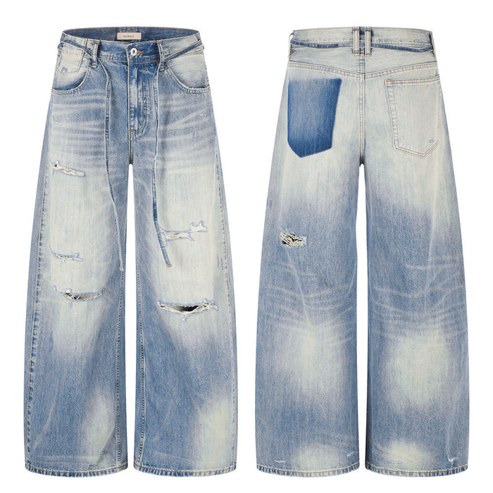 Wide-leg distressed jeans with gradient wash, front and back view