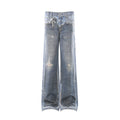 Men's wide-leg distressed jeans in vintage blue wash with raw-edge seams, ripped knees, and frayed hems shown front and back
