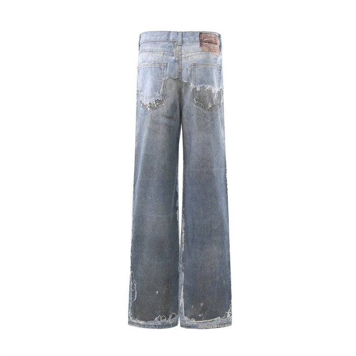 Back view of wide-leg distressed blue jeans with faded wash and frayed hem edges