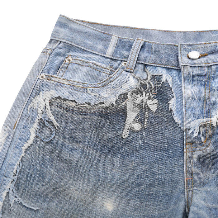 Close-up of front left pocket and waistband on faded distressed blue jeans with frayed trim