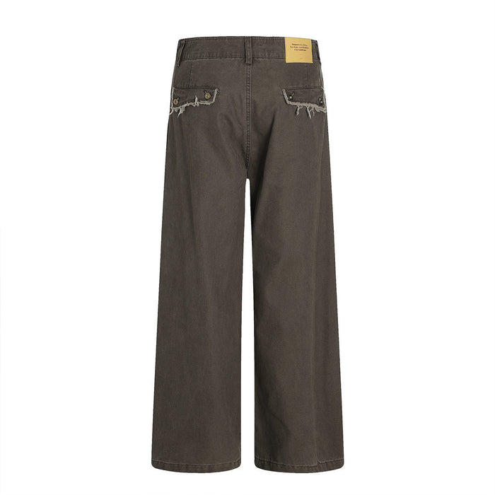 Back view of dark gray wide-leg pants with frayed rear pocket details and raw seam accents