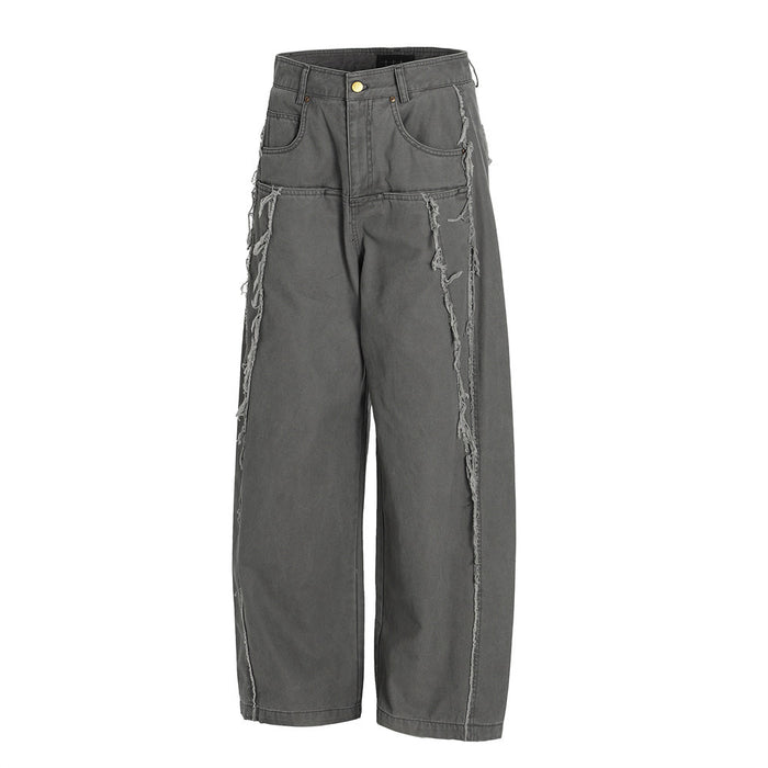 Angled front view of charcoal frayed seam pants with patch pockets and wide legs